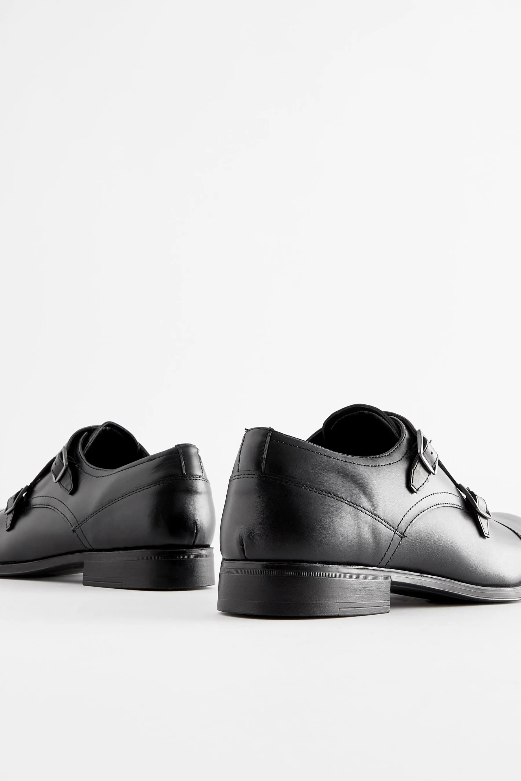 Scarpe in pelle con doppia fibbia