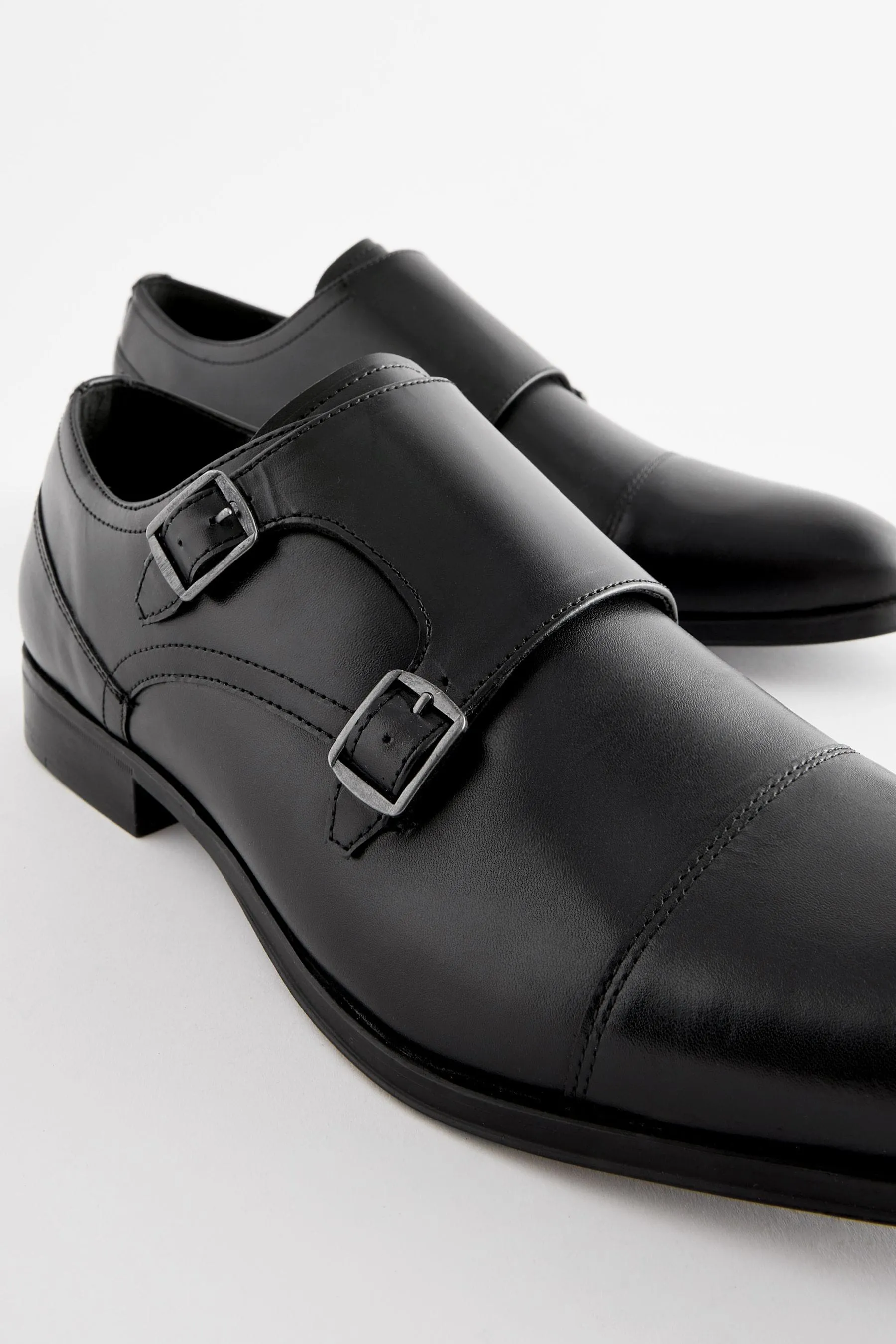 Scarpe in pelle con doppia fibbia